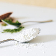 Spoon of white powder